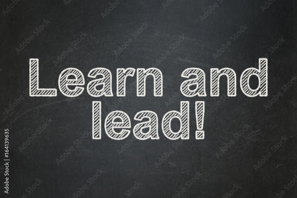 Obraz premium Learning concept: Learn and Lead! on chalkboard background