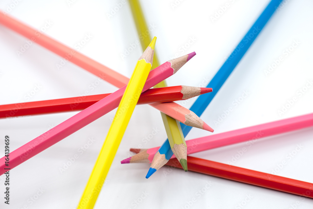 Group of color pencils isolated on white background, Colored pencils can be used as background and add text or word, Wooden colored pencils and free space Group of color pencils isolated on white background, Colored pencils can be used as background and add text or word, Wooden colored pencils and free space