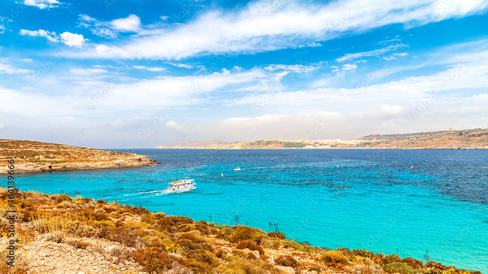 Coast of the Comino island between the islands of Malta and Gozo in the Mediterranean Sea, Europe.