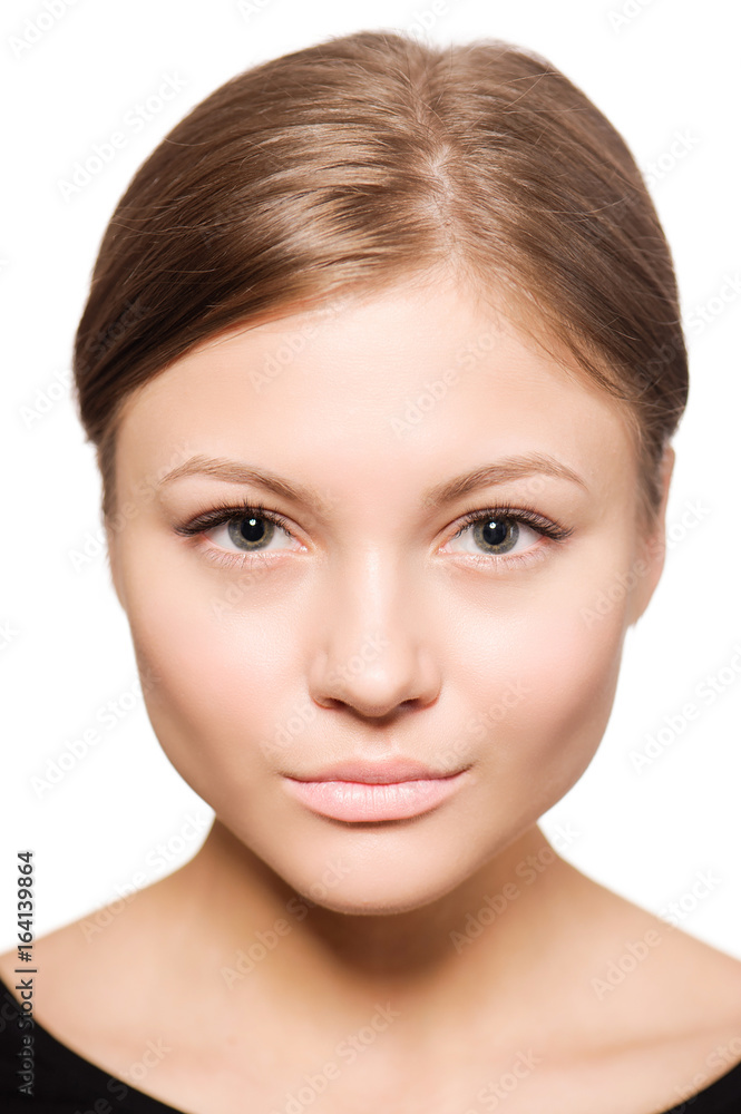 Beautiful woman face close up studio on white Beautiful woman face close up studio on white