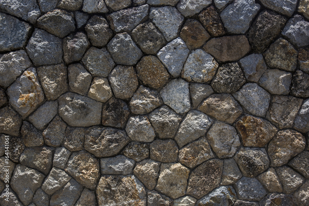 the Rock wall seamless texture. Design background the Rock wall seamless texture. Design background