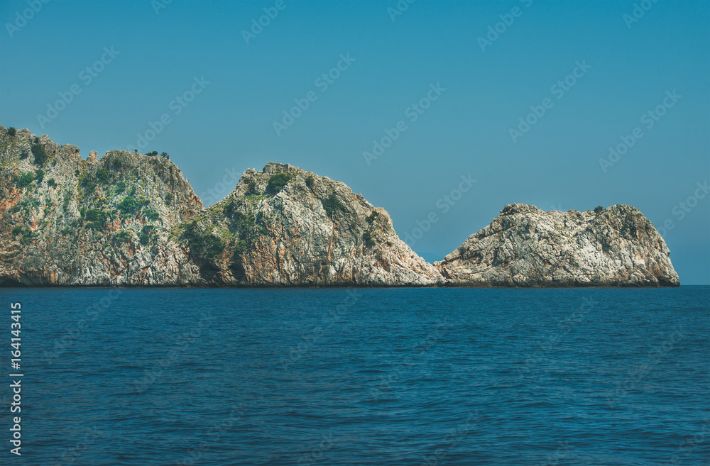 Rocks of cape Cilvarda in Alanya, Mediterranean Turkey. View from sea