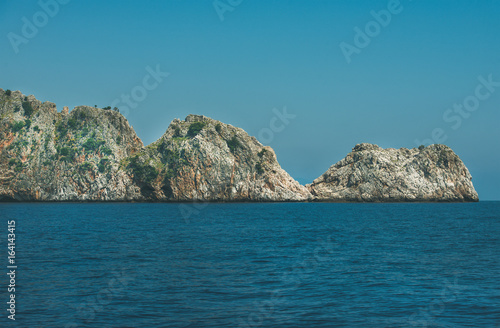 Rocks of cape Cilvarda in Alanya, Mediterranean Turkey. View from sea