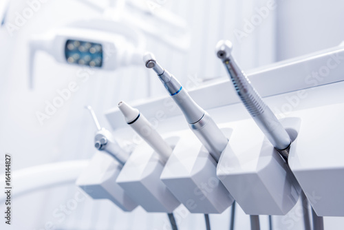 selective focus of various dental drills in dentist office