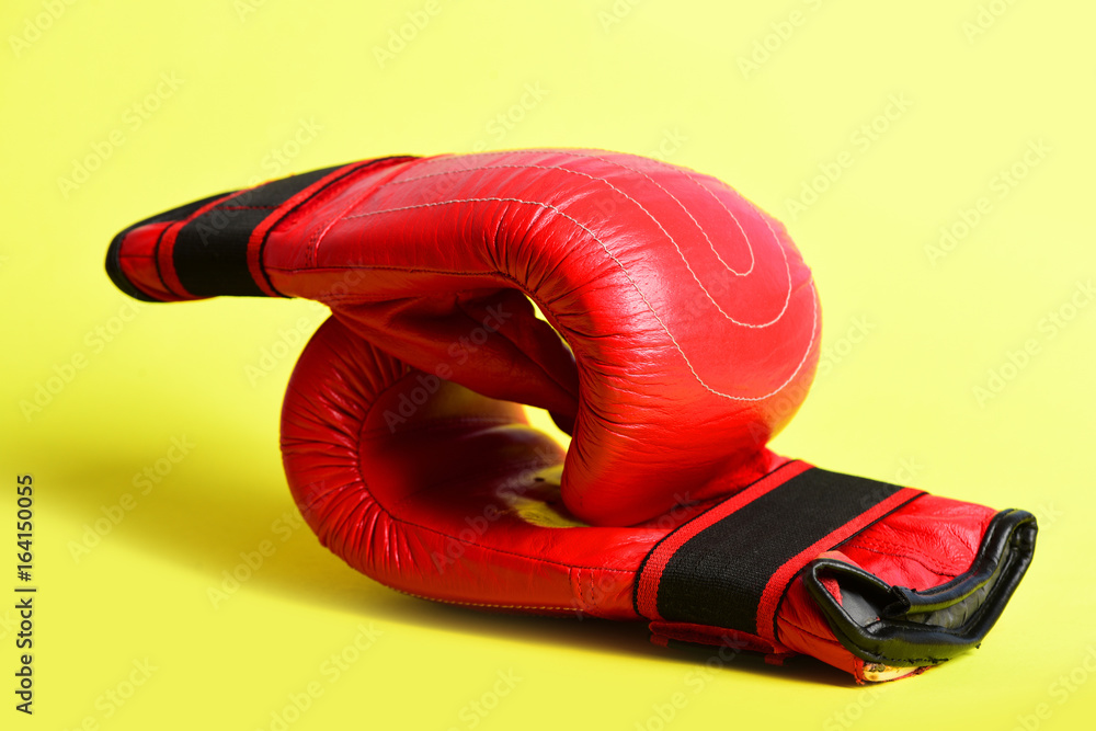 Gloves for thai boxing in striking red and black color