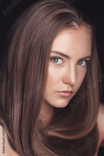 portrait of beautiful young caucasian woman with long hair