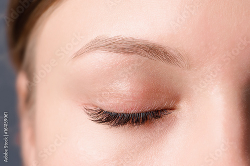 Closeup shot of female eye with day makeup photo