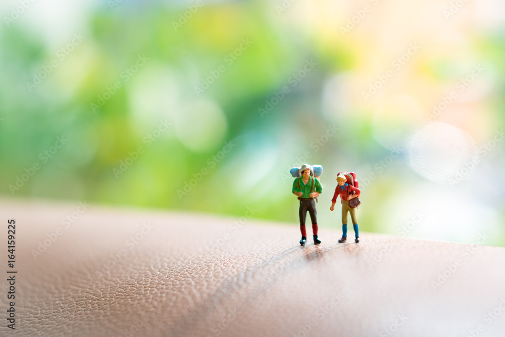 Miniature people, lover traveler on journey using as tourism concept