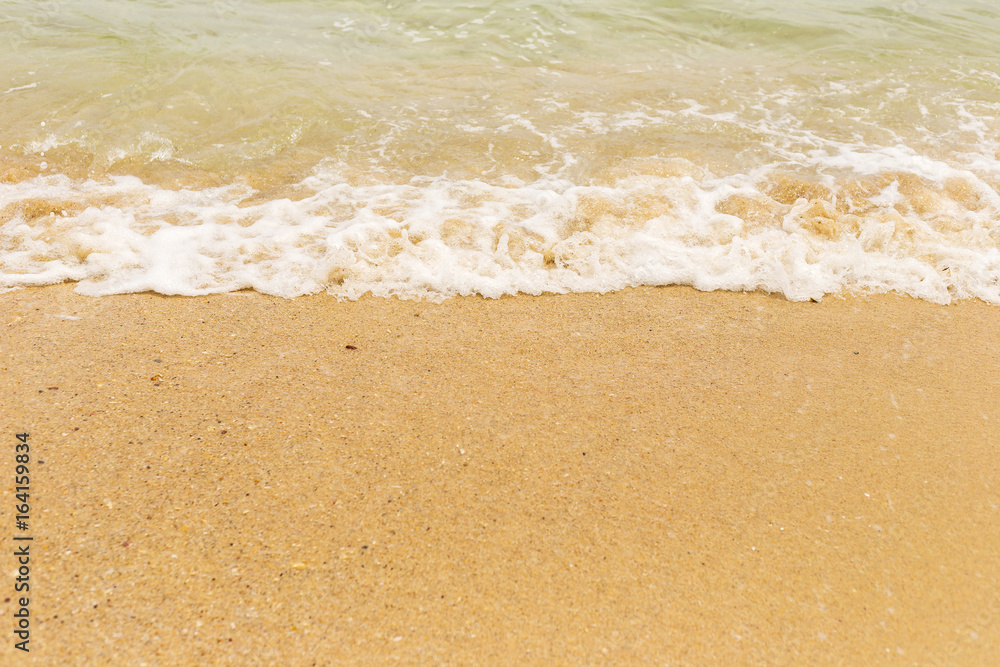 Sand and white foam from wave in perspective view. Sand and white foam from wave in perspective view.