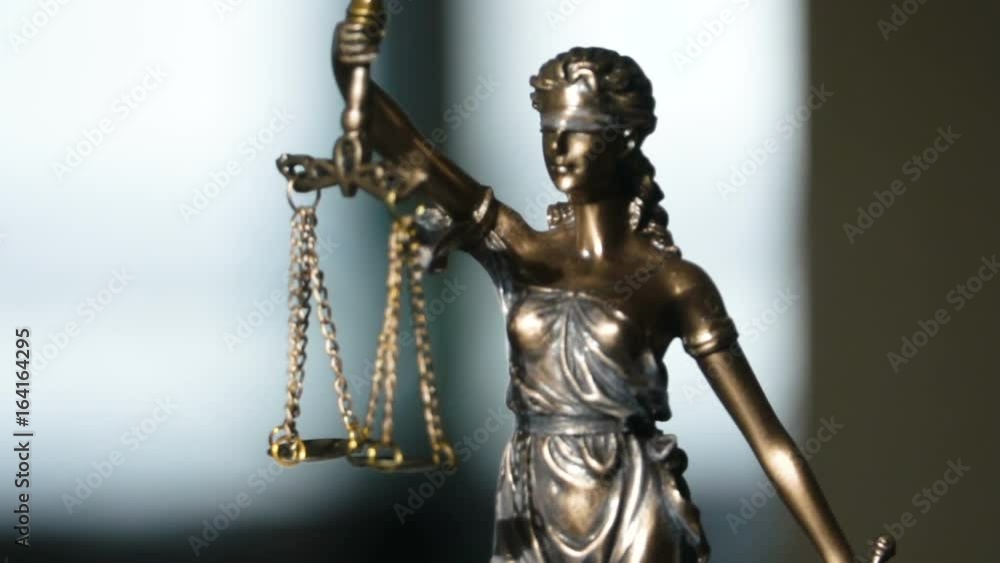 The Statue of Justice - lady justice or Iustitia the Roman goddess of Justice The Statue of Justice - lady justice or Iustitia the Roman goddess of Justice