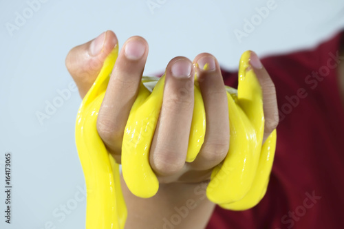 Kid Playing Hand Made Toy Called Slime, Selective focus on Slime