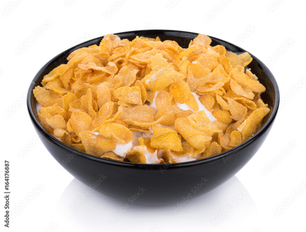Corn flakes with milk isolated on white background Corn flakes with milk isolated on white background