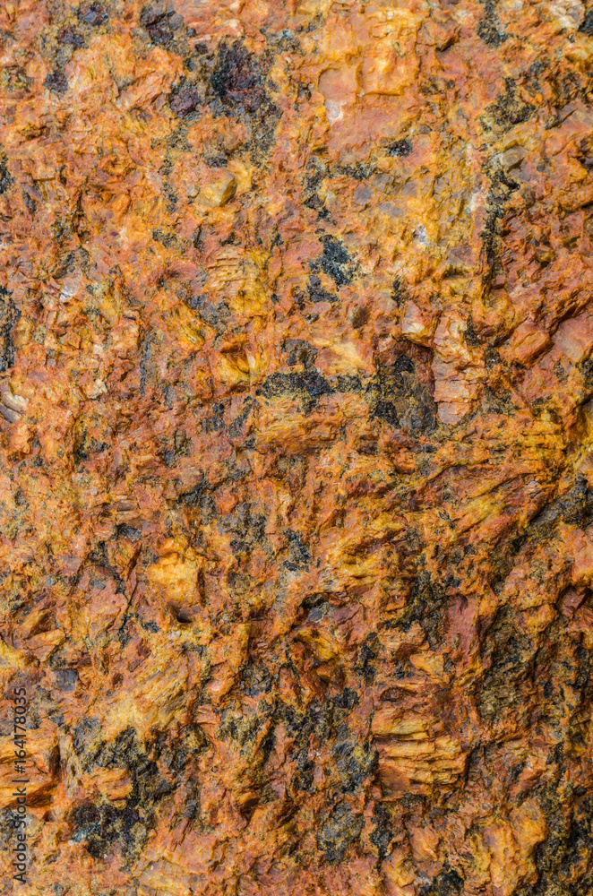 Heterogeneous texture of natural stone orange. Heterogeneous texture of natural stone orange.