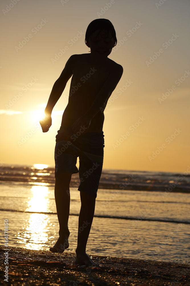 Silhouette of a kid