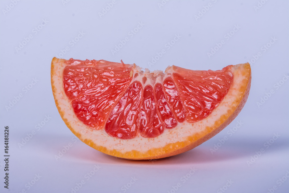 Fresh slice of grapefruit Fresh slice of grapefruit