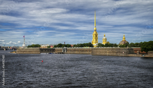 Peter and Paul Fortress viewed from Neva river in Saint Petersburg, Russia. The fortress was built in 18 century and is now one of the main attractions in Saint-Petersburg. photo