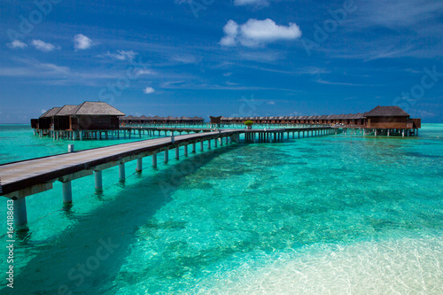 beach with water bungalows at Maldives