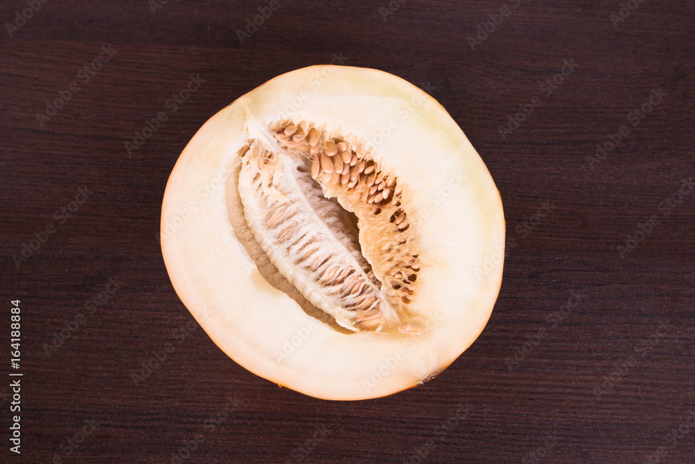 Melon on a dark table Melon on a dark table