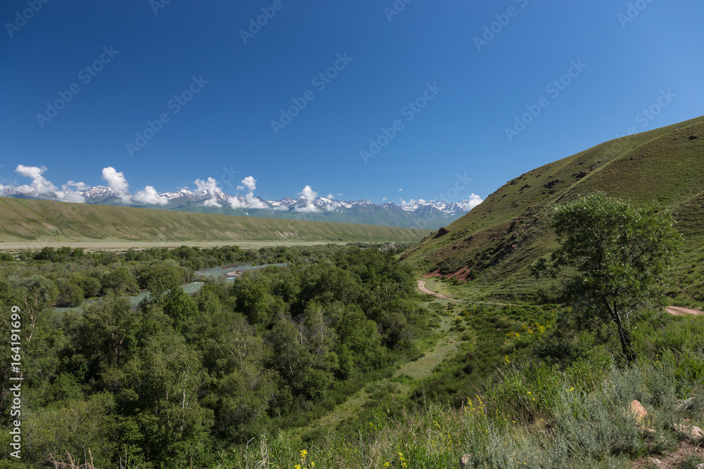 Mountain river landscape. Kyrgyzstan. Kekemeren River Mountain river landscape. Kyrgyzstan. Kekemeren River