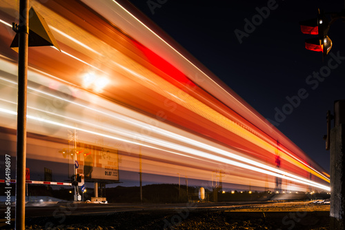 illuminated Train Against Sky At Night