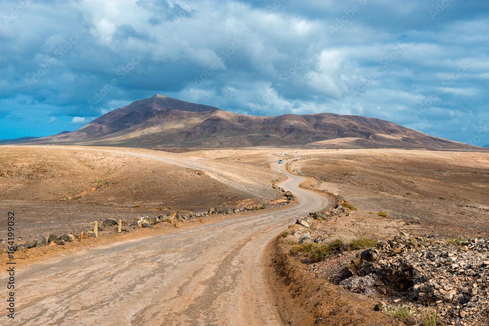 Winding Road in Arid Landscape on Lanzarote, Canary Islands, Spain