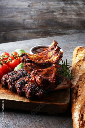 Spicy hot grilled spare ribs from a summer BBQ served with fresh