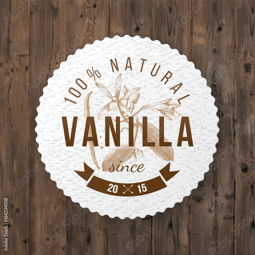Label with type design and vanilla plant