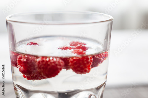 Wallpaper Mural Sparkling raspberry lemonade water in a transparent glass Torontodigital.ca