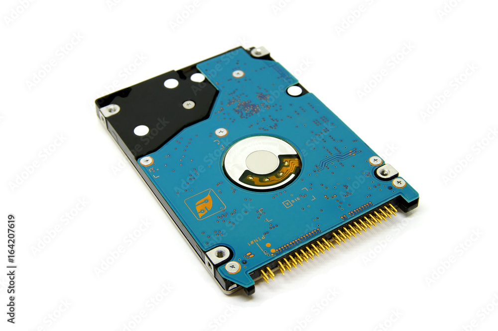 Technology, hard disk close up on a white background. Technology, hard disk close up on a white background.