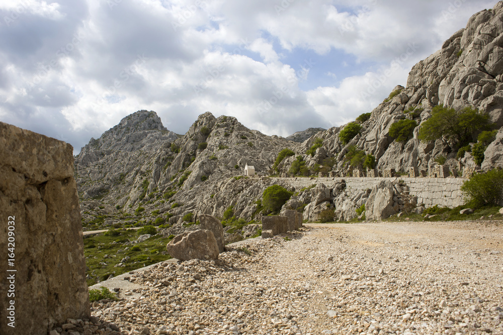 Famous Majstorska cesta (Master road) under Tulove grede, part of Velebit mountain in Croatia