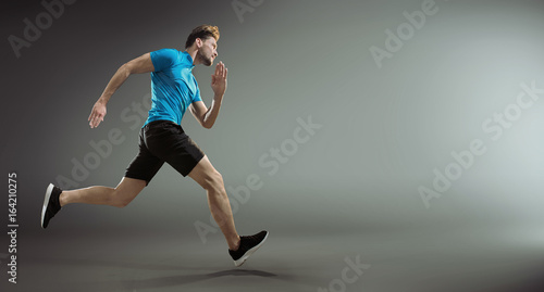 Portrait of a handsome young athlete during race
