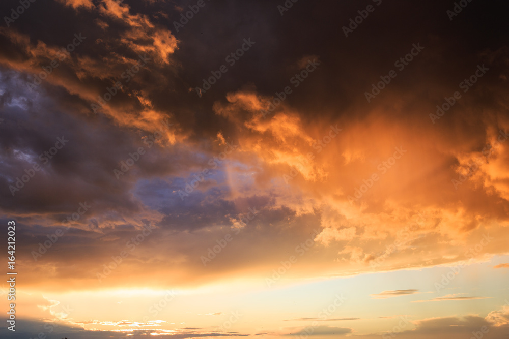 Colourful dramatic sunset clouds background, sky, cloudscape