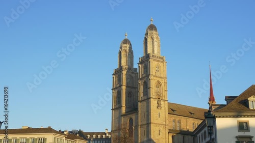 sunset time zurich grossmunster cathedral famous front panorama 4k switzerland
 photo