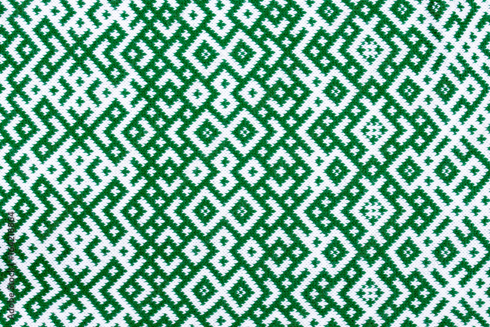 Knitted texture with the pattern of National symbol of Latvia - Lielvardes (place in Latvia) belt that is one of the most magnificent Latvian symbols. Latvian traditional historical ornaments. Knitted texture with the pattern of National symbol of Latvia - Lielvardes (place in Latvia) belt that is one of the most magnificent Latvian symbols. Latvian traditional historical ornaments.
