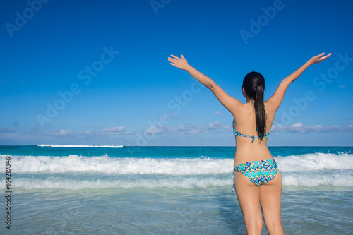 Young girl enjoying her vacations in Cancun beach, Mexico © mardoz
