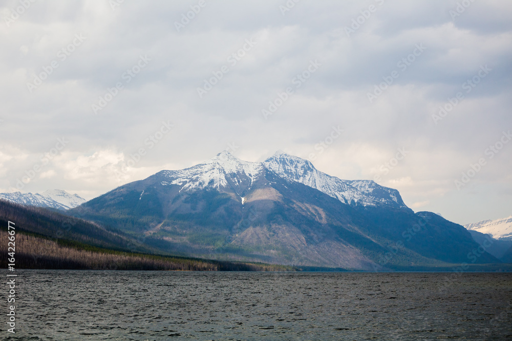 Mountains and Storm Clouds Over Large Lake