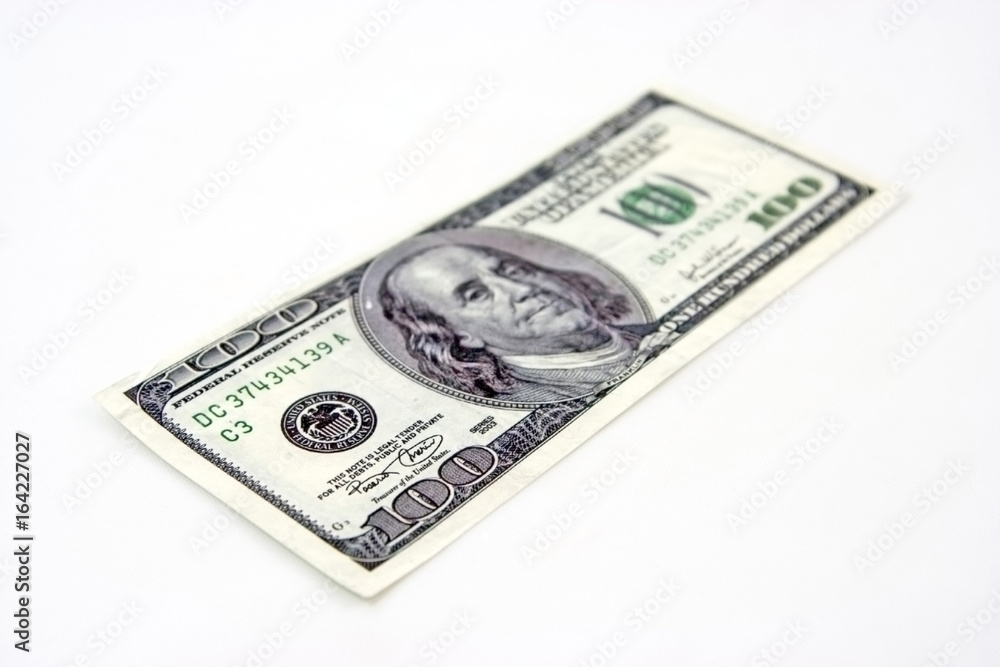 Shallow focus one hundred dollar bill. Isolated. Shallow focus one hundred dollar bill. Isolated.