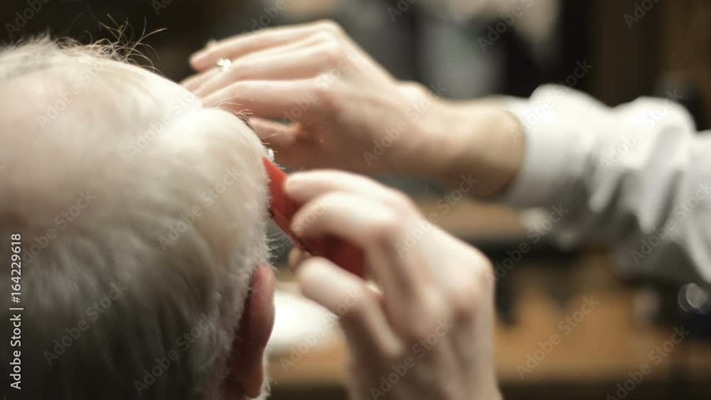 Active retired elderly old bearded senior man aged with graying hair in barber shop hairstylist hairstyle getting Haircut and shaving , head, beard and mustache Active retired elderly old bearded senior man aged with graying hair in barber shop hairstylist hairstyle getting Haircut and shaving , head, beard and mustache