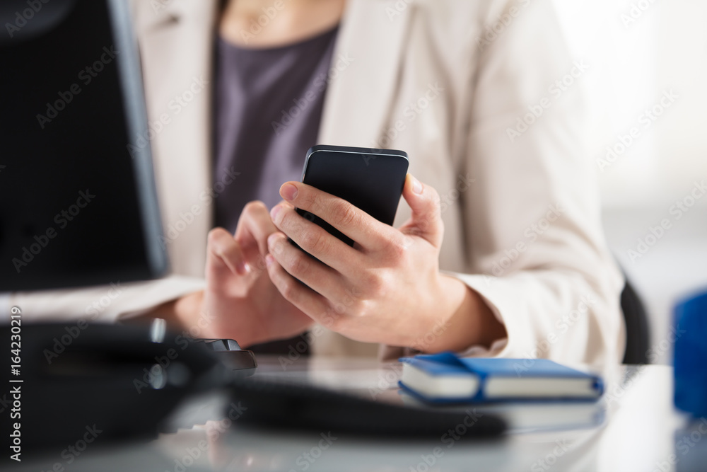 Businesswoman Using Smart Phone Businesswoman Using Smart Phone