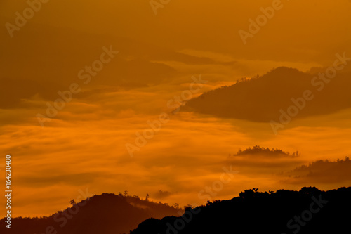 Morning sun During the mass of fog in the mountains