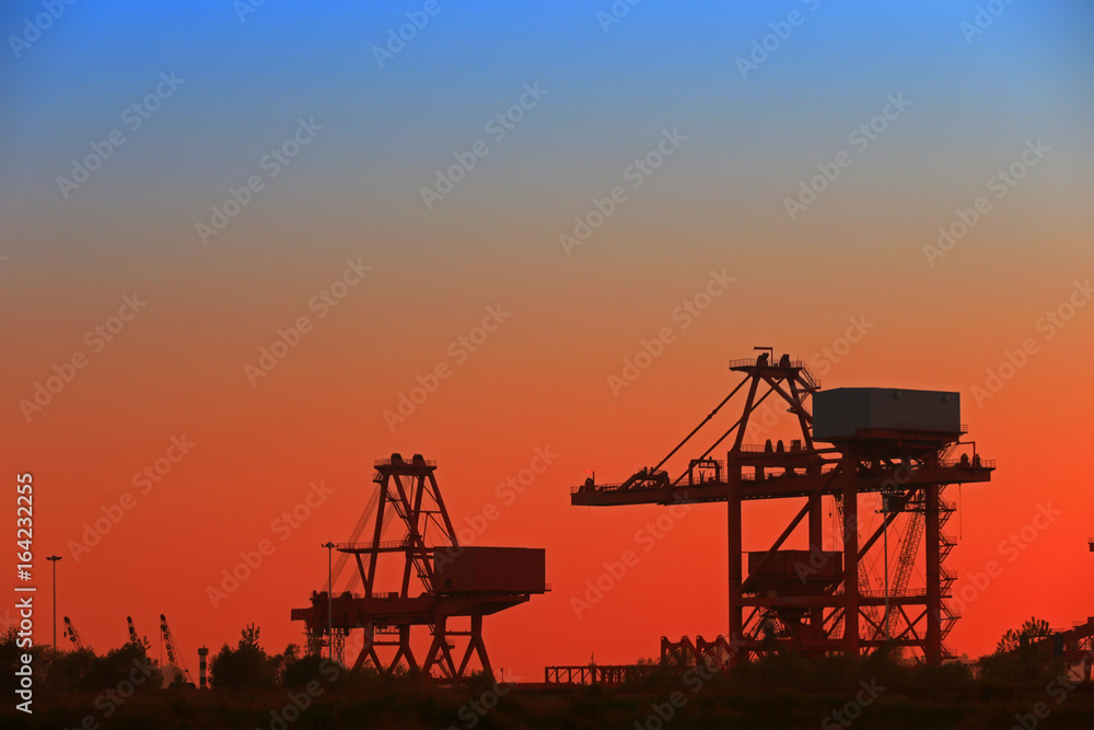 Port crane unloading container ships Port crane unloading container ships
