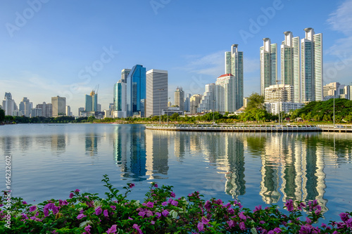 Photography Bangkok city downtown at dusk with reflection of skyline
