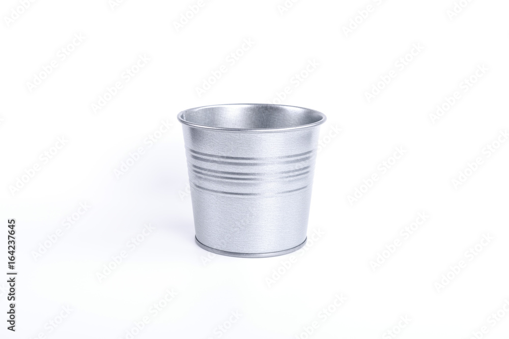 A tin flower pot isolated on white background.