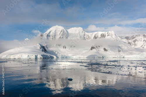 Icebergs, glaciers and mountains along the Antarctic Peninsula.