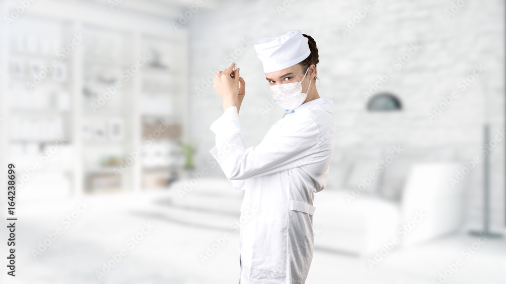 Beautiful medical woman doctor in uniform. Studio painted background. Concept of profitable health care. Beautiful medical woman doctor in uniform. Studio painted background. Concept of profitable health care.