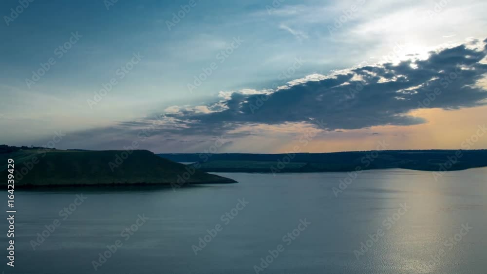 A beautiful sunset behind the ocean and mountains. A beautiful sunset behind the ocean and mountains.