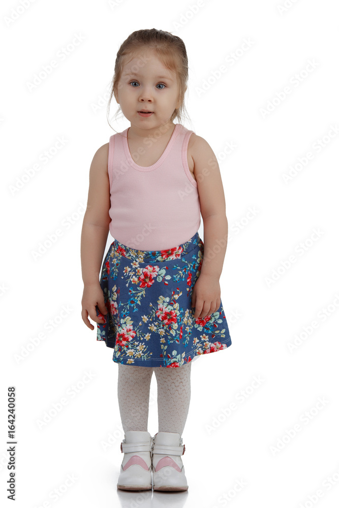 Cheerful little girl on white background isolated, vertical frame. Cheerful little girl on white background isolated, vertical frame.