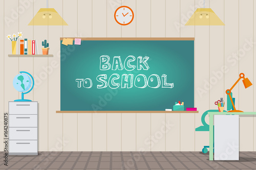 School interior is class with a cupboard for books, school board