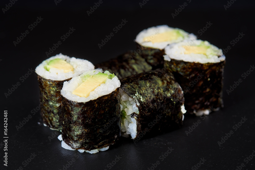 Sushi on black background. Perfect for creating sushi restaurant menu. Part of series. Sushi on black background. Perfect for creating sushi restaurant menu. Part of series.