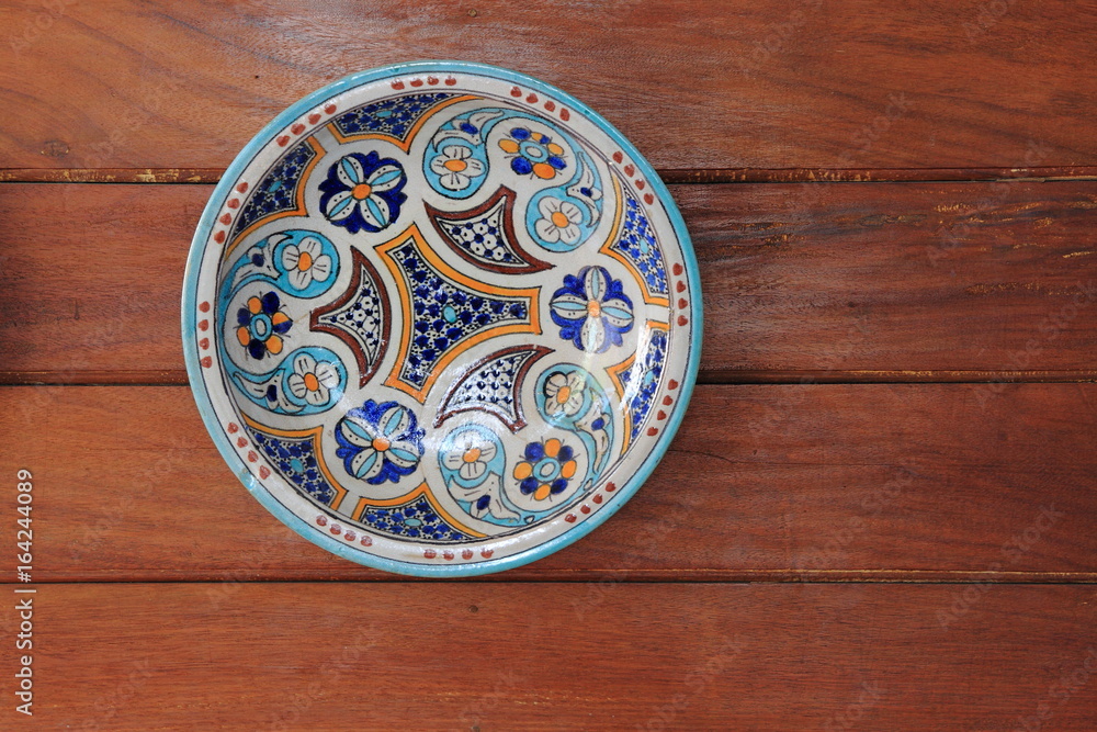 Porcelain plate on a wooden table
